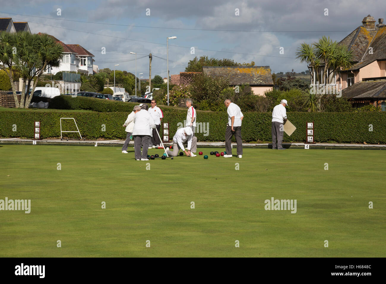 pensioners crown green bowls match on sunny day Stock Photo