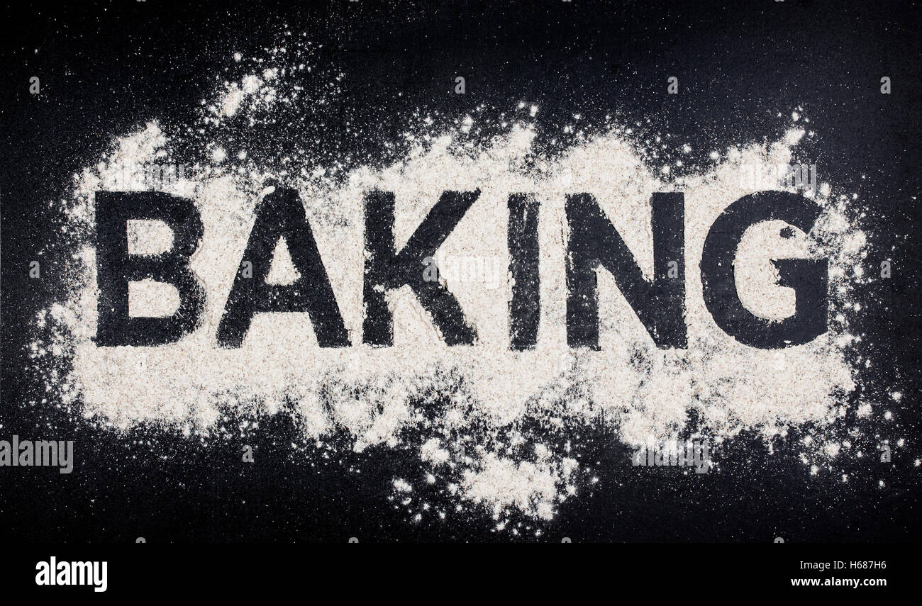 word-baking-written-in-white-flour-on-dark-table-stock-photo-alamy