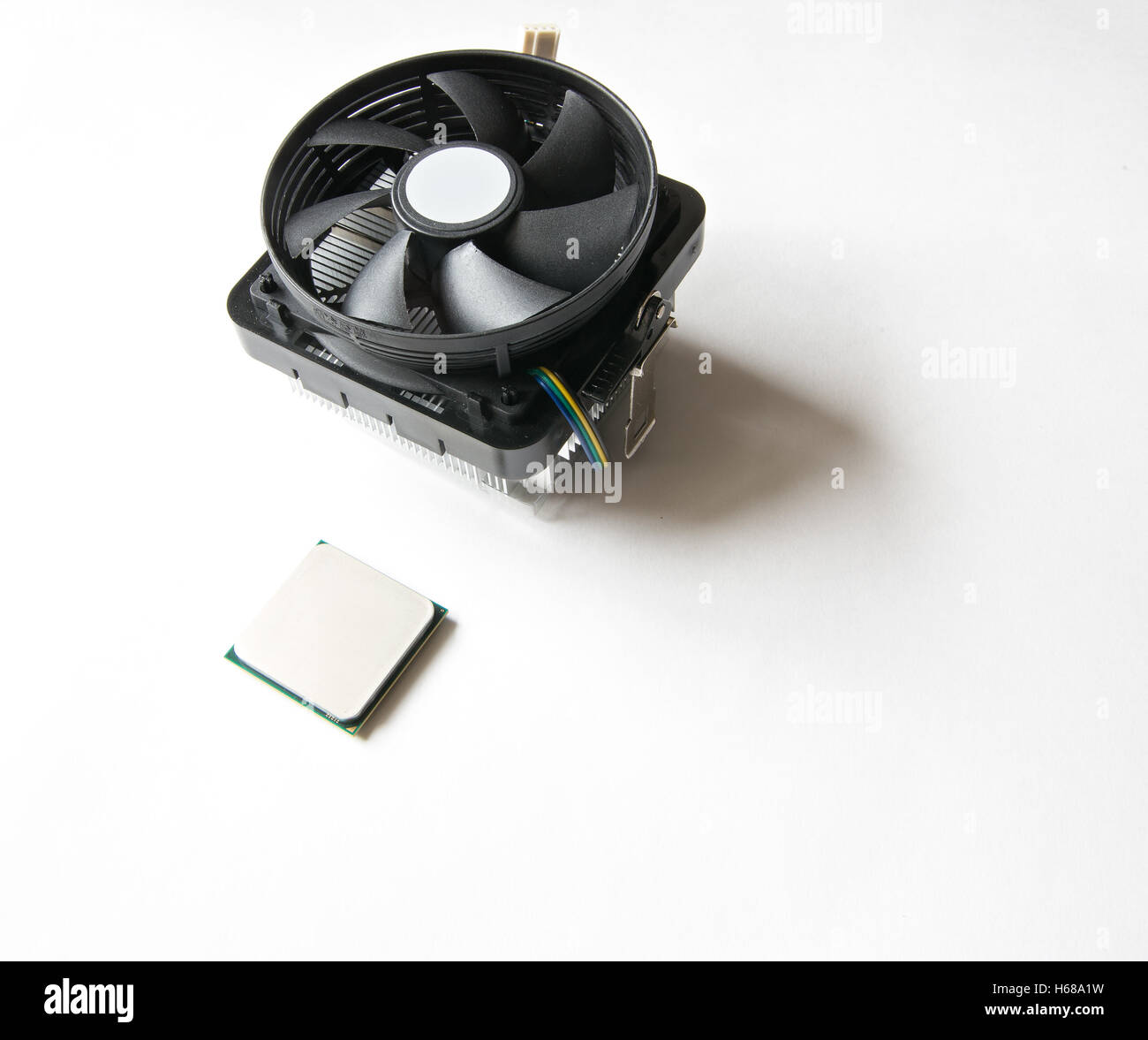 Computer components on a white background. CPU, Cooler Stock Photo