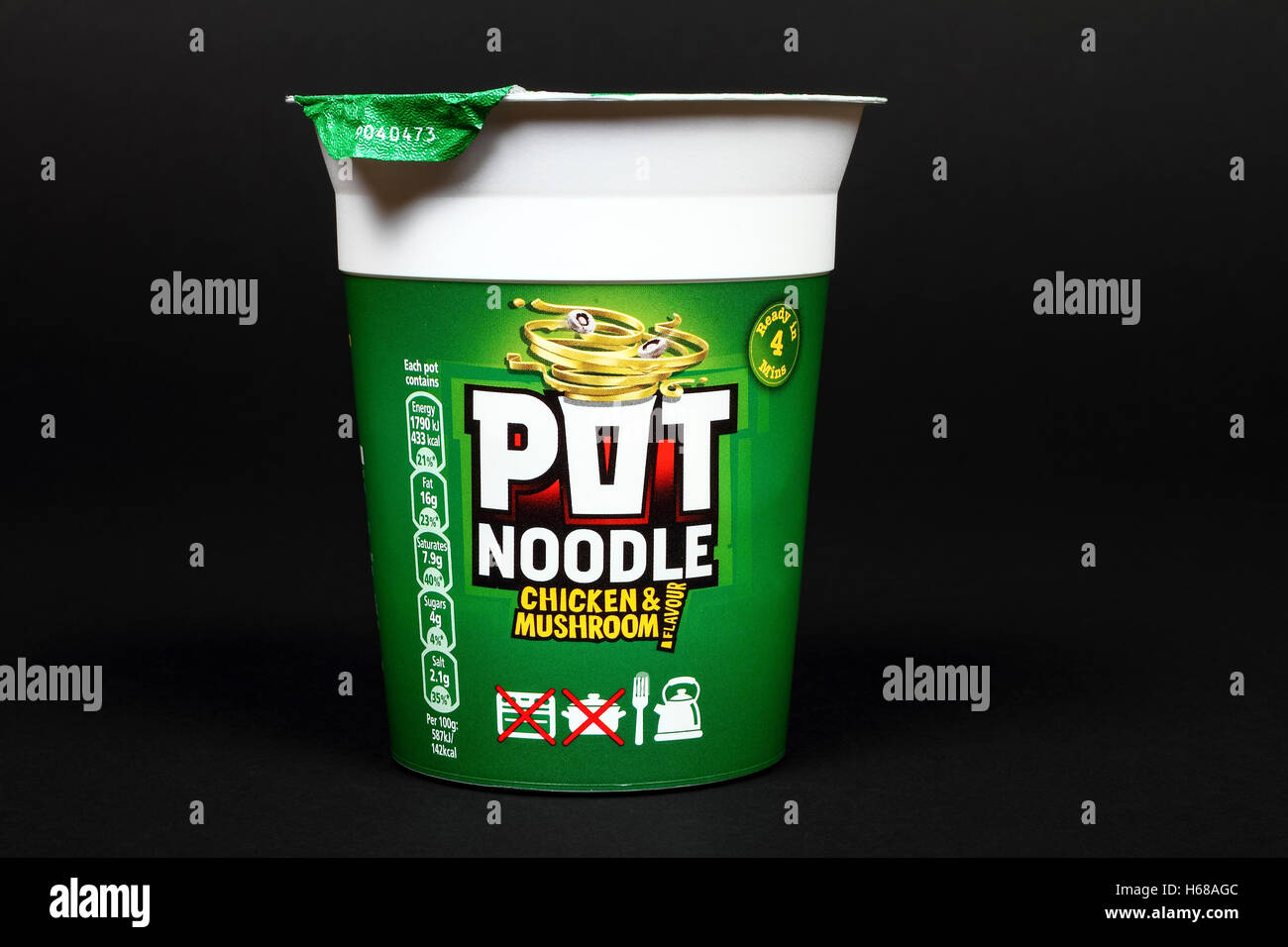 Golden wonder chicken and mushroom pot noodle isolated on a black background Stock Photo