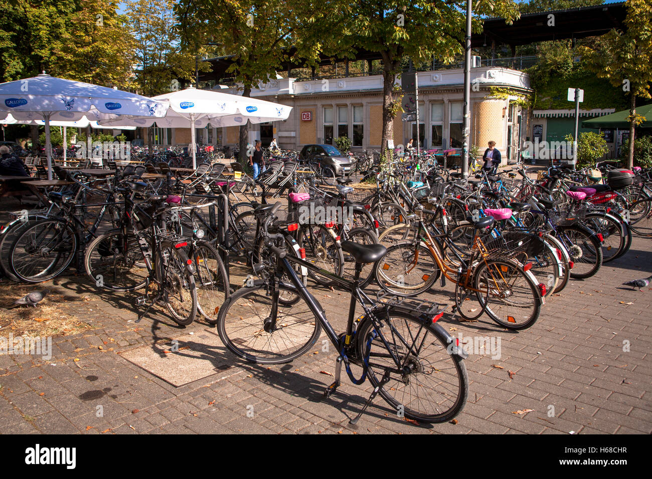 Europe, Germany, Cologne, parked bicycles in front of the station Cologne West at the Hans-Boeckler square. Stock Photo