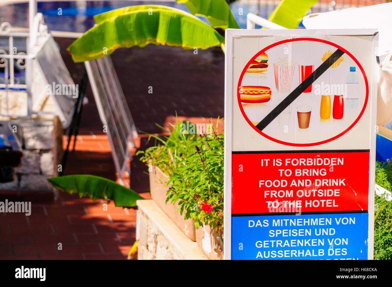 Sign at the entrance of a hotel warning guests not to bring in food and drink from outside. Stock Photo
