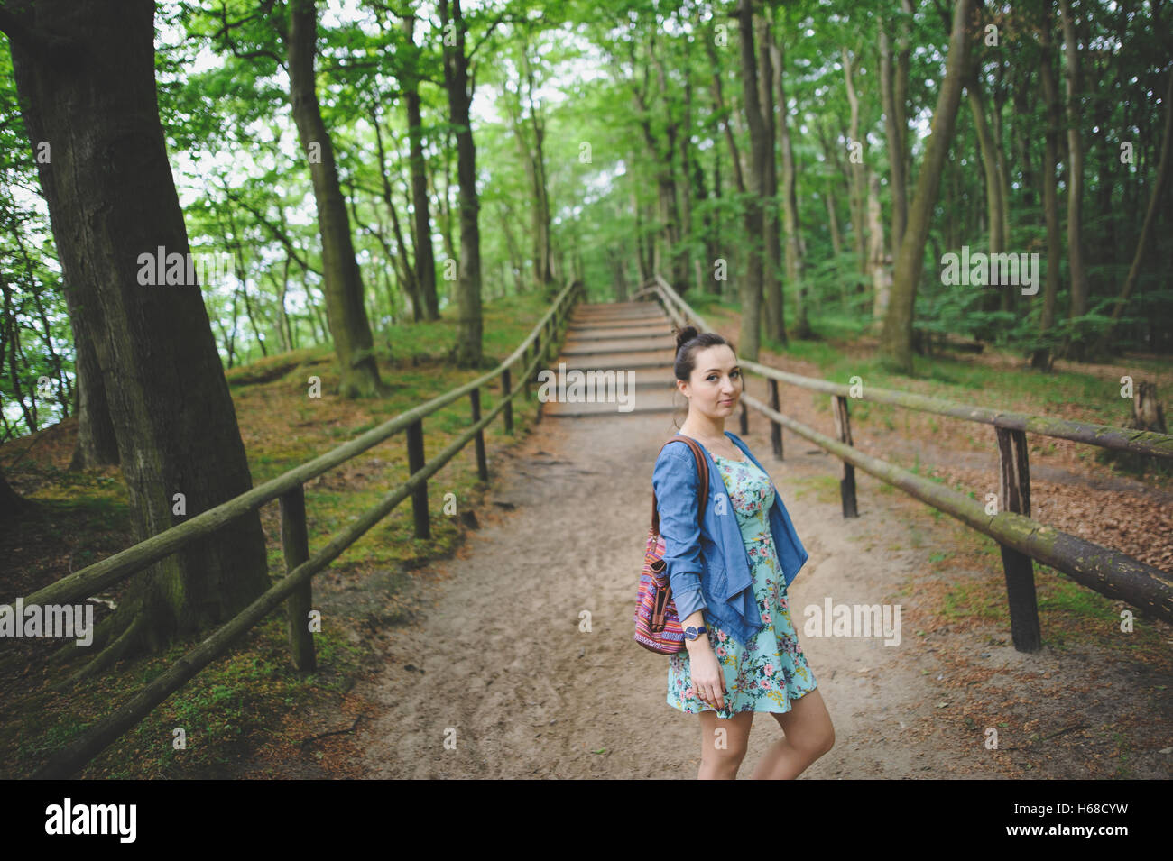 Young girl on a walk in the forest Stock Photo - Alamy