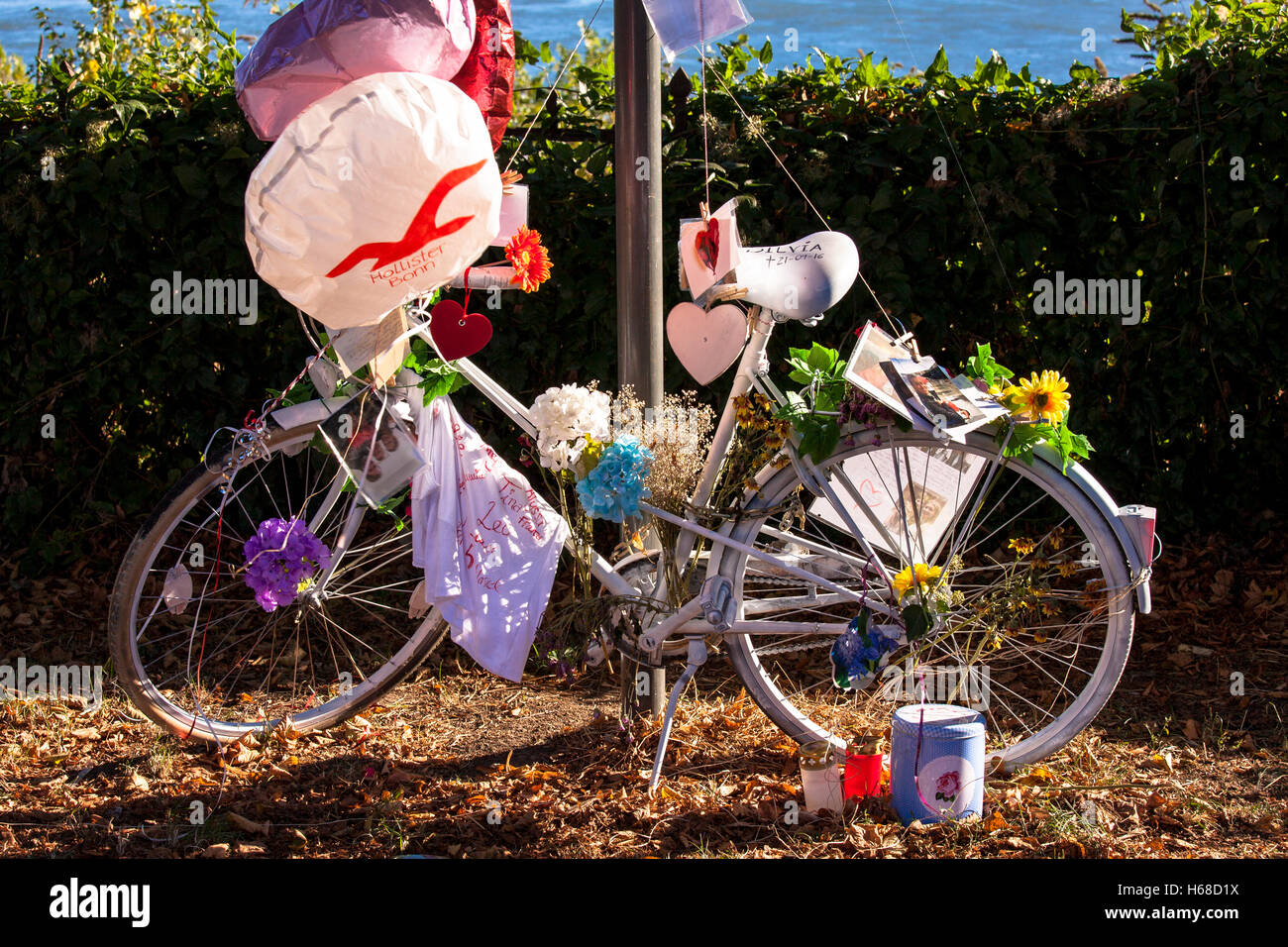 Germany, Cologne, ghost bike, white adorned bicycle reminds of a cyclist, who had a seriously or deadly accident at this place.. Stock Photo