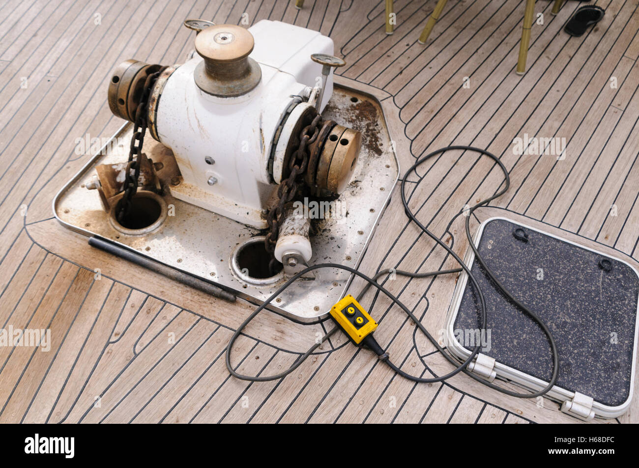Motorised winch for raising and lowering the anchors of a ship. Stock Photo