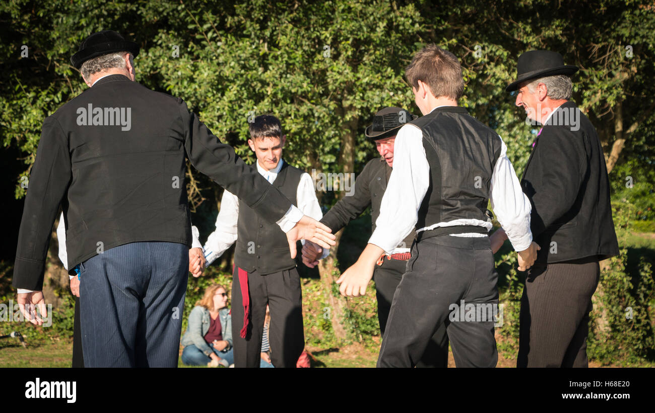 Brem sur Mer, France July 09, 2016 men dance round in a show of