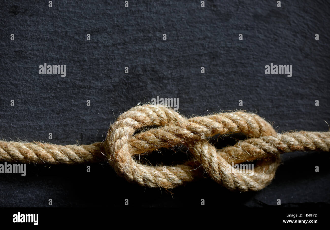 sailor's knot on stone plate Stock Photo
