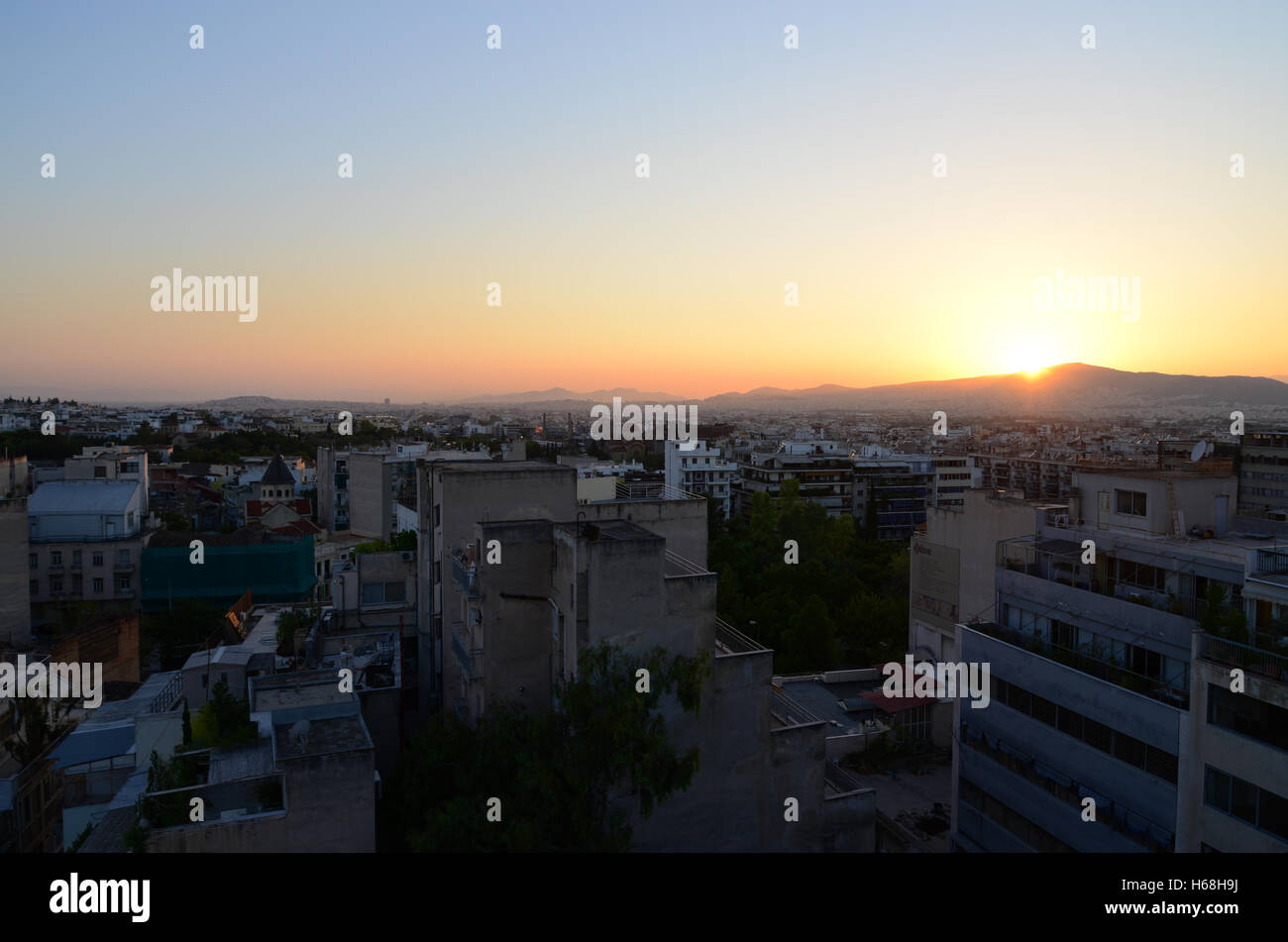 Greece, Athens, Rooftops and Sunset Stock Photo