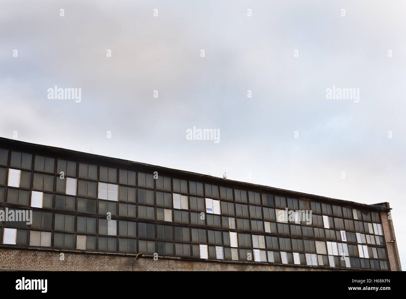 top of an old factory building with many windows Stock Photo