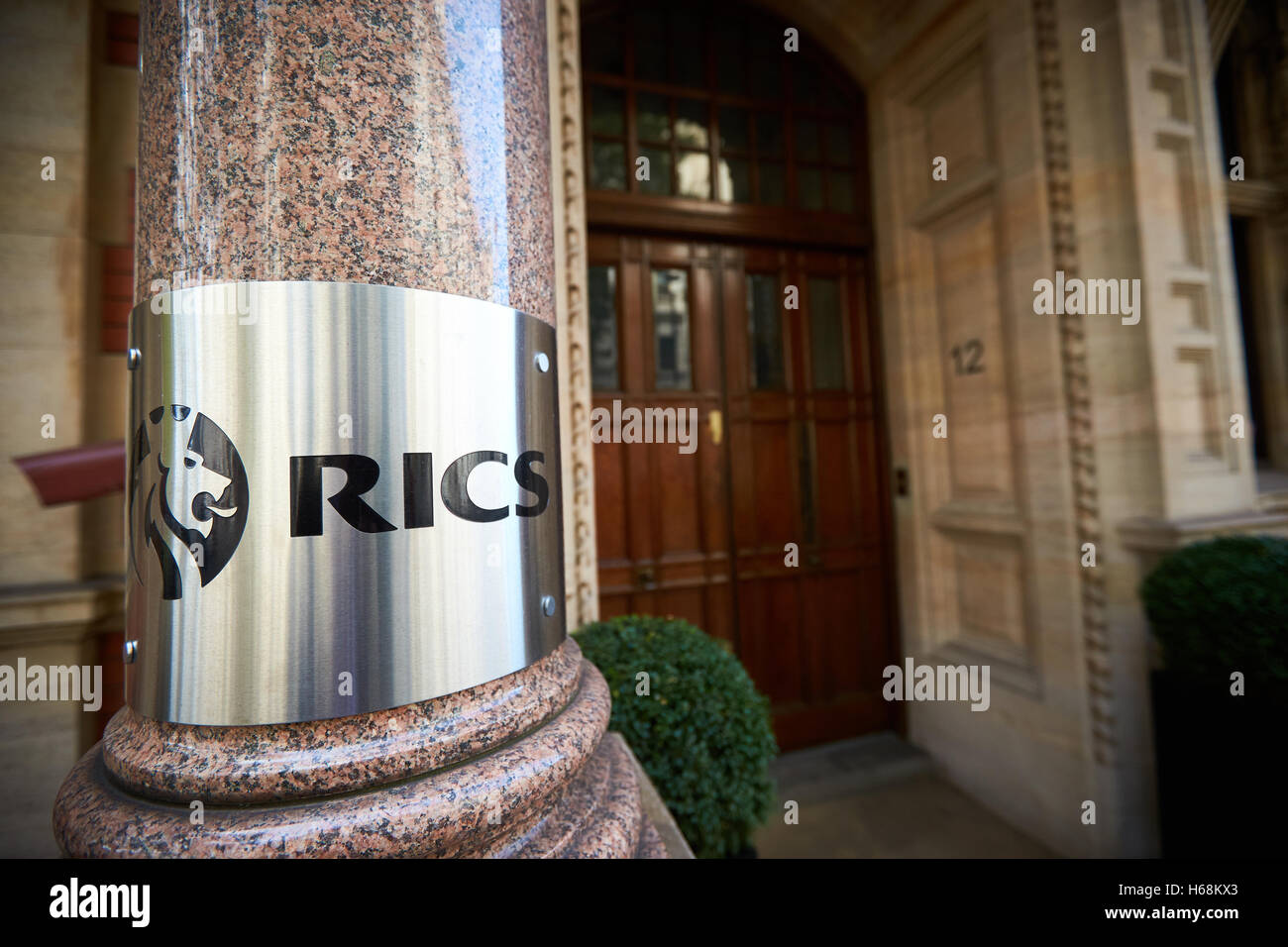 The Royal Institution of Chartered Surveyors (RICS) Headquarters on Parliament Square in London Stock Photo