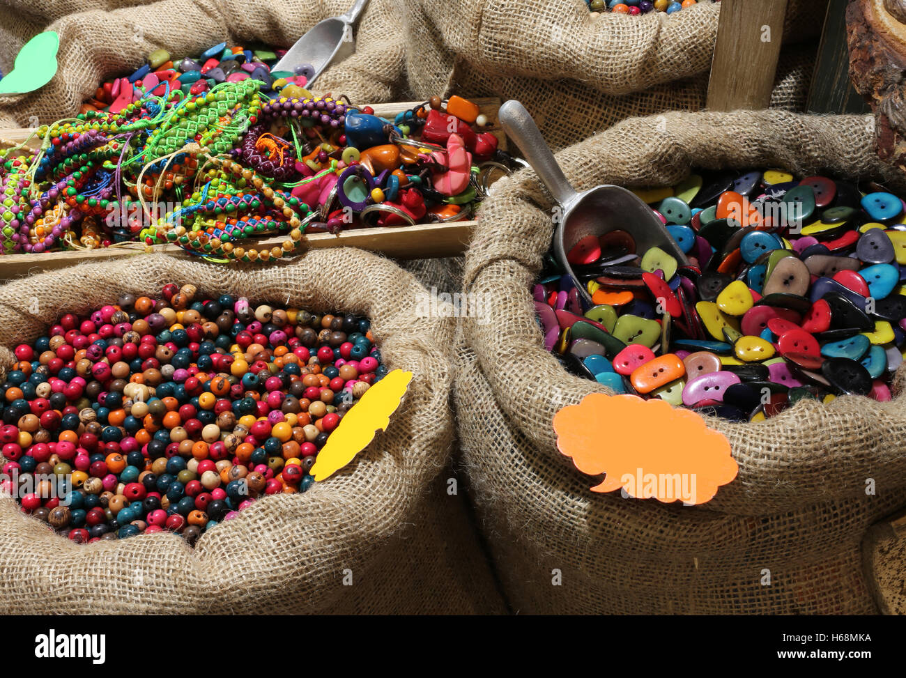 Jute Bags Filled With Trinkets And Decorations Buttons And