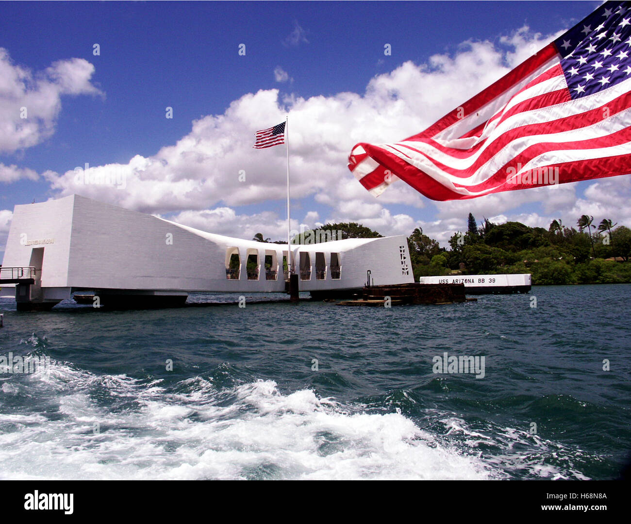 View of the USS Arizona Memorial in Pearl harbor with an American Stock
