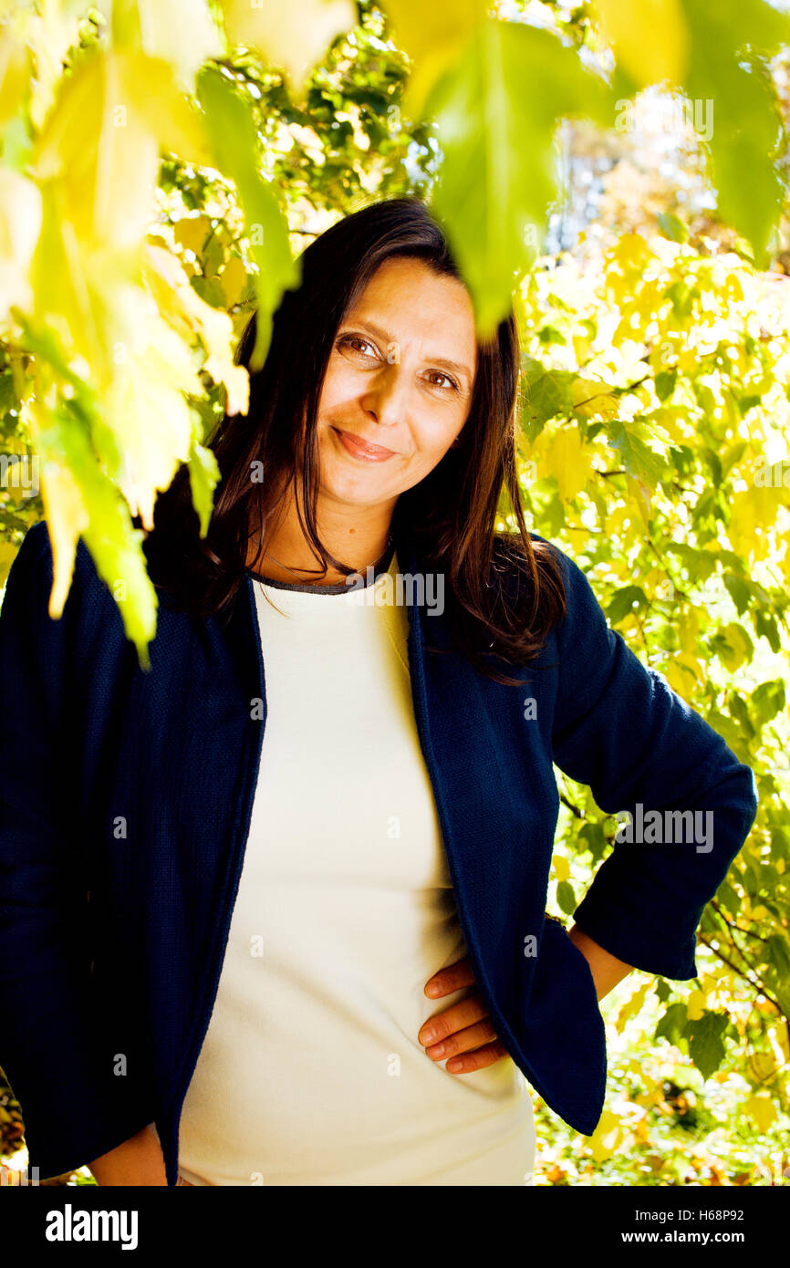 beauty mature brunette woman in park Stock Photo - Alamy