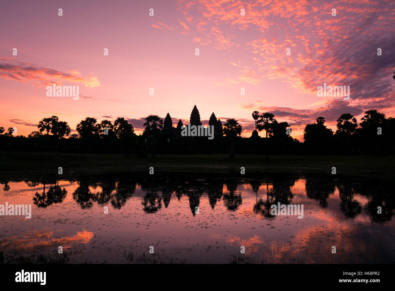 Angkor Wat Sunrise Landscape - Reflection in holy lake Stock Photo