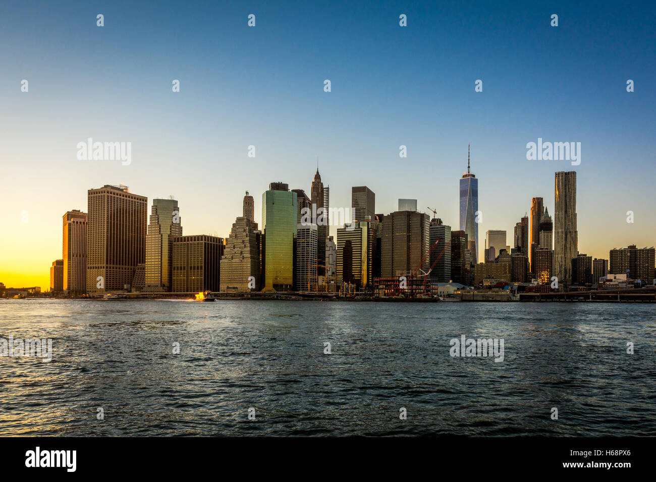 New York, Manhattan Downtown Skyline Sunset / Night Landscape, USA Stock Photo