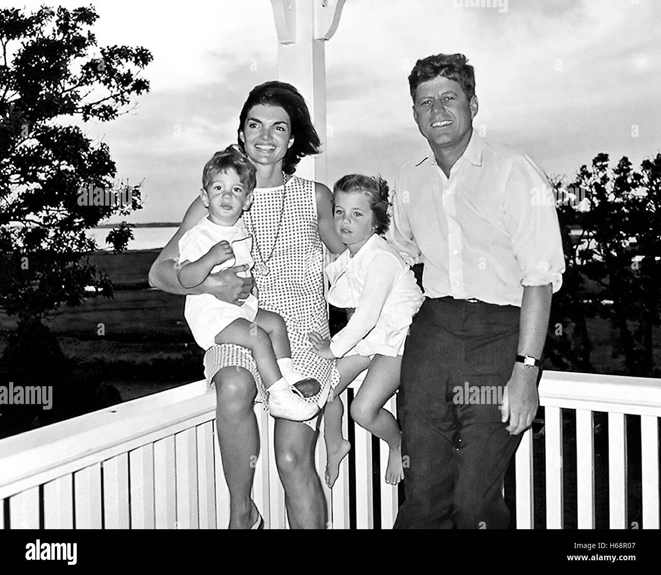 President Kennedy and family, Hyannis Port..L-R: John F. Kennedy Jr., Mrs. Kennedy, Caroline Bouvier Kennedy, President Kennedy. August 4, 1962. Photograph by Cecil Stoughton, White House. Stock Photo