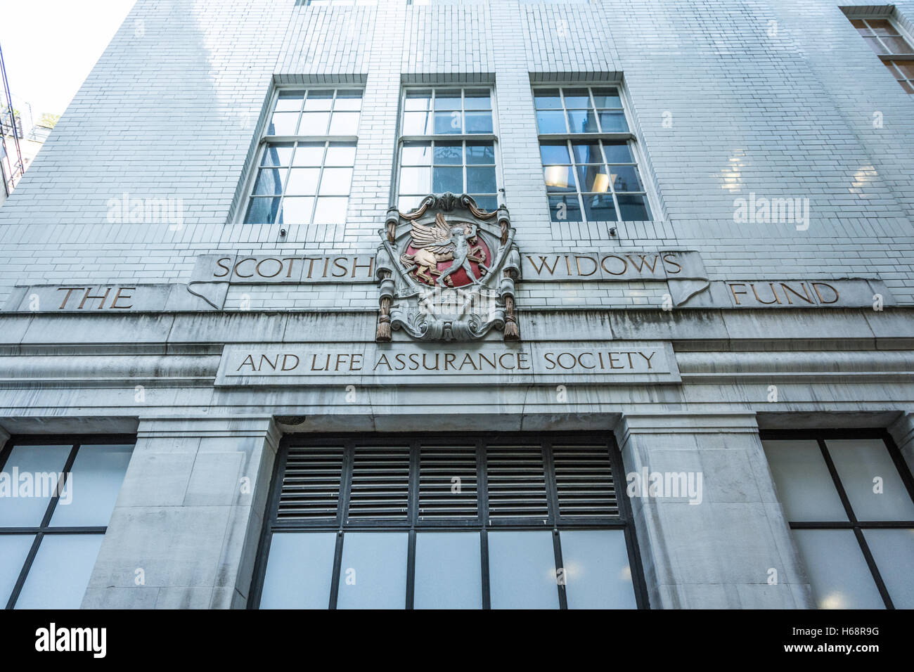 Crest outside the Scottish Widows Fund and Life Assurance Society now part of Lloyds Banking Group Stock Photo