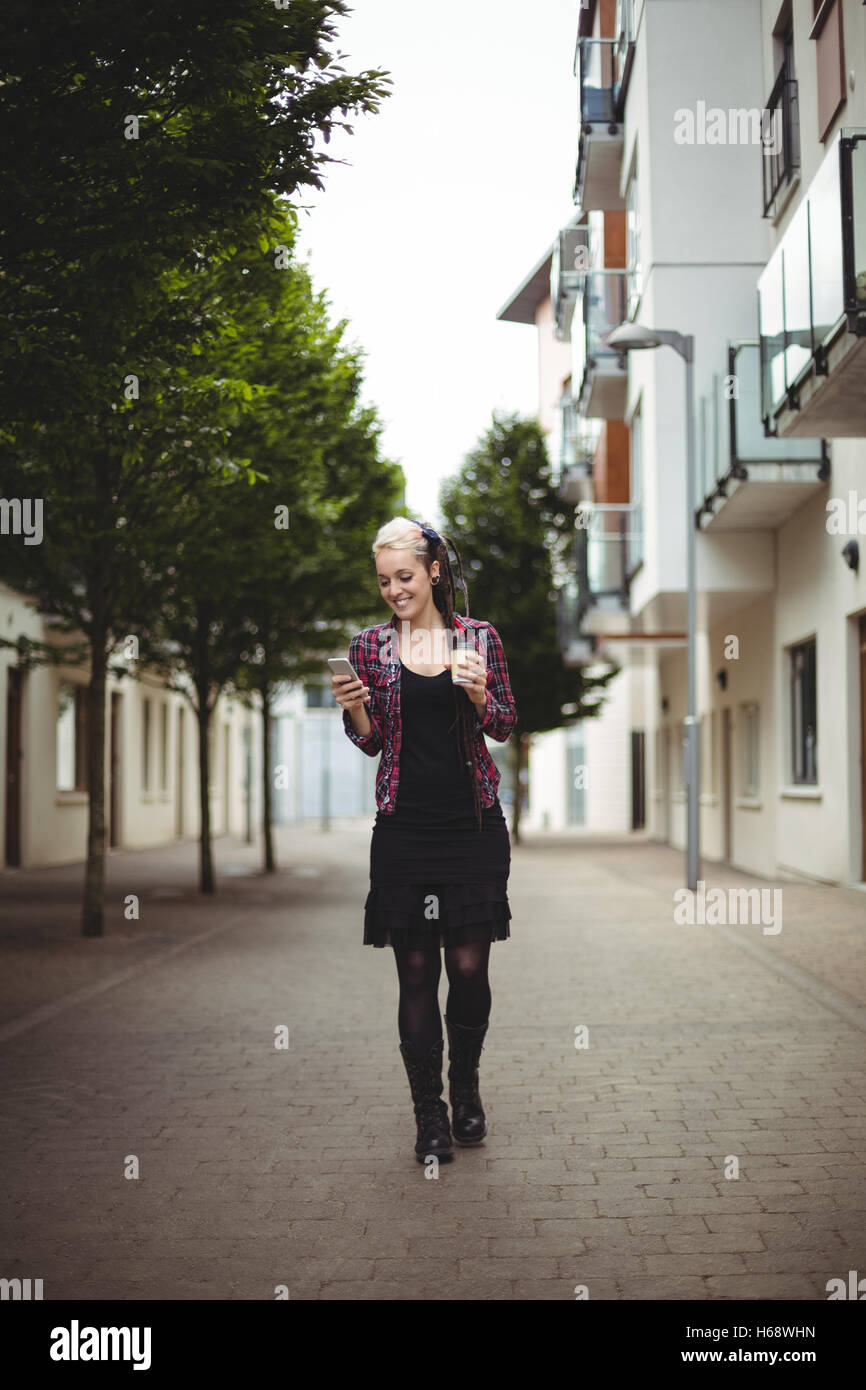 Beautiful woman walking street hi-res stock photography and images - Alamy