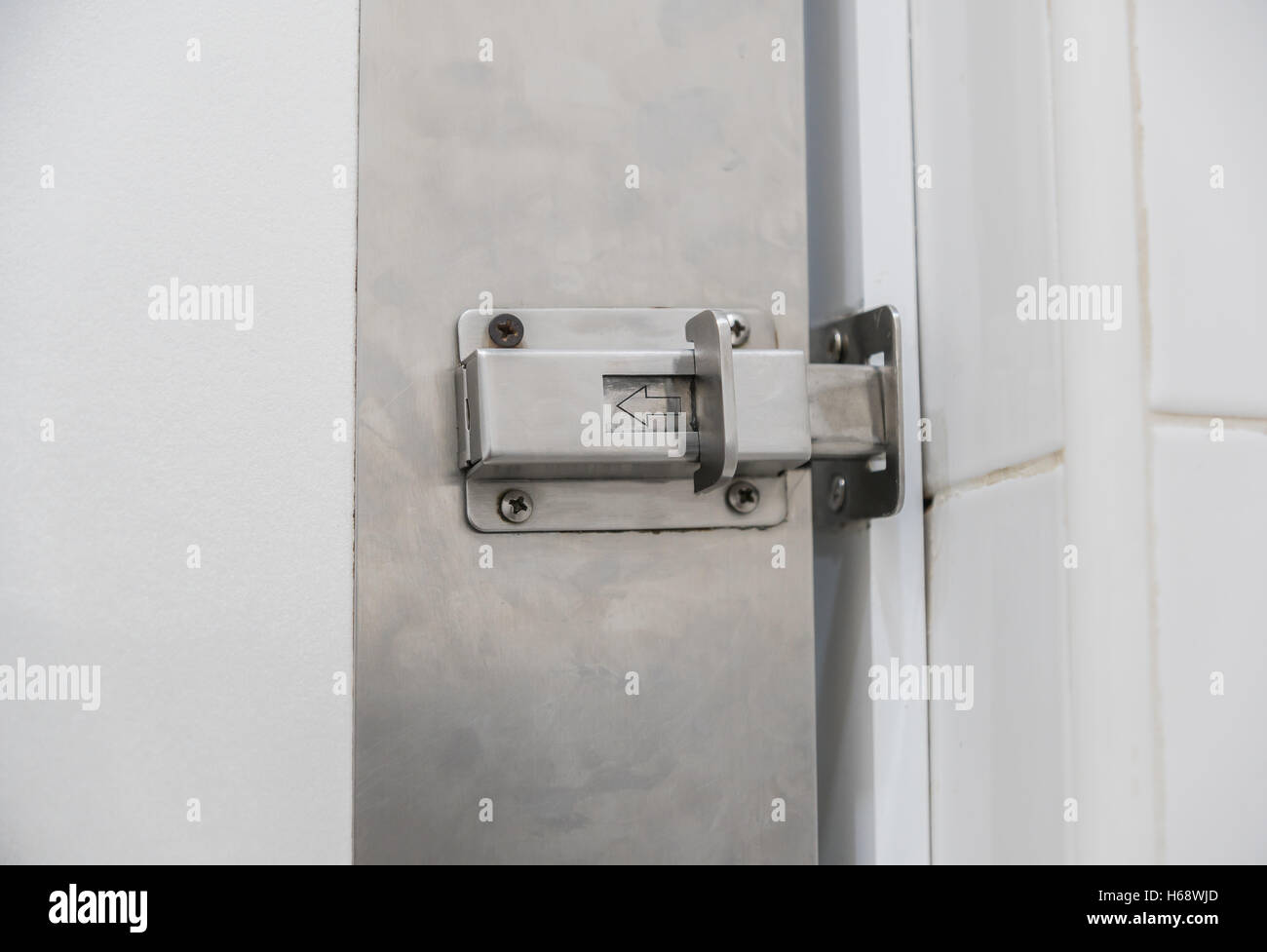 Safety latch or locked doors in condo Stock Photo Alamy