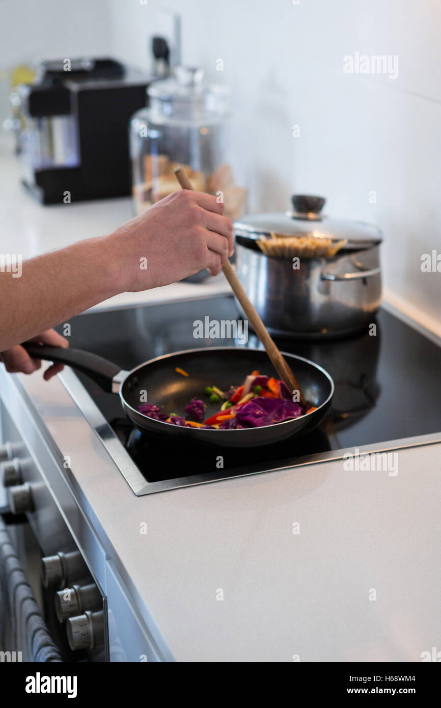 Food in hand hi-res stock photography and images - Alamy