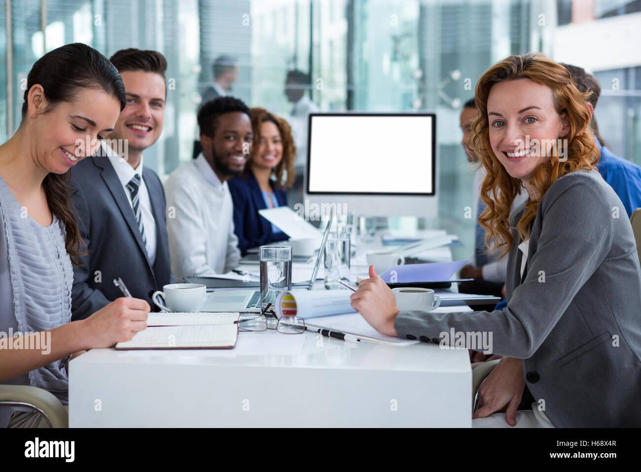 Portrait of businesspeople during video conference Stock Photo