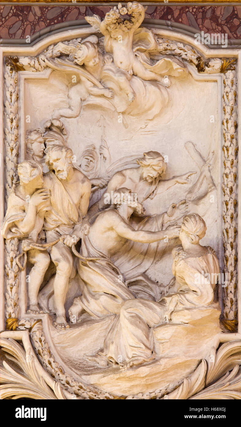 ROME, ITALY - MARCH 10, 2016: The relief of scene from life of St. Andrew the Apostle by Andrea Bergondi (18. cent.). Stock Photo