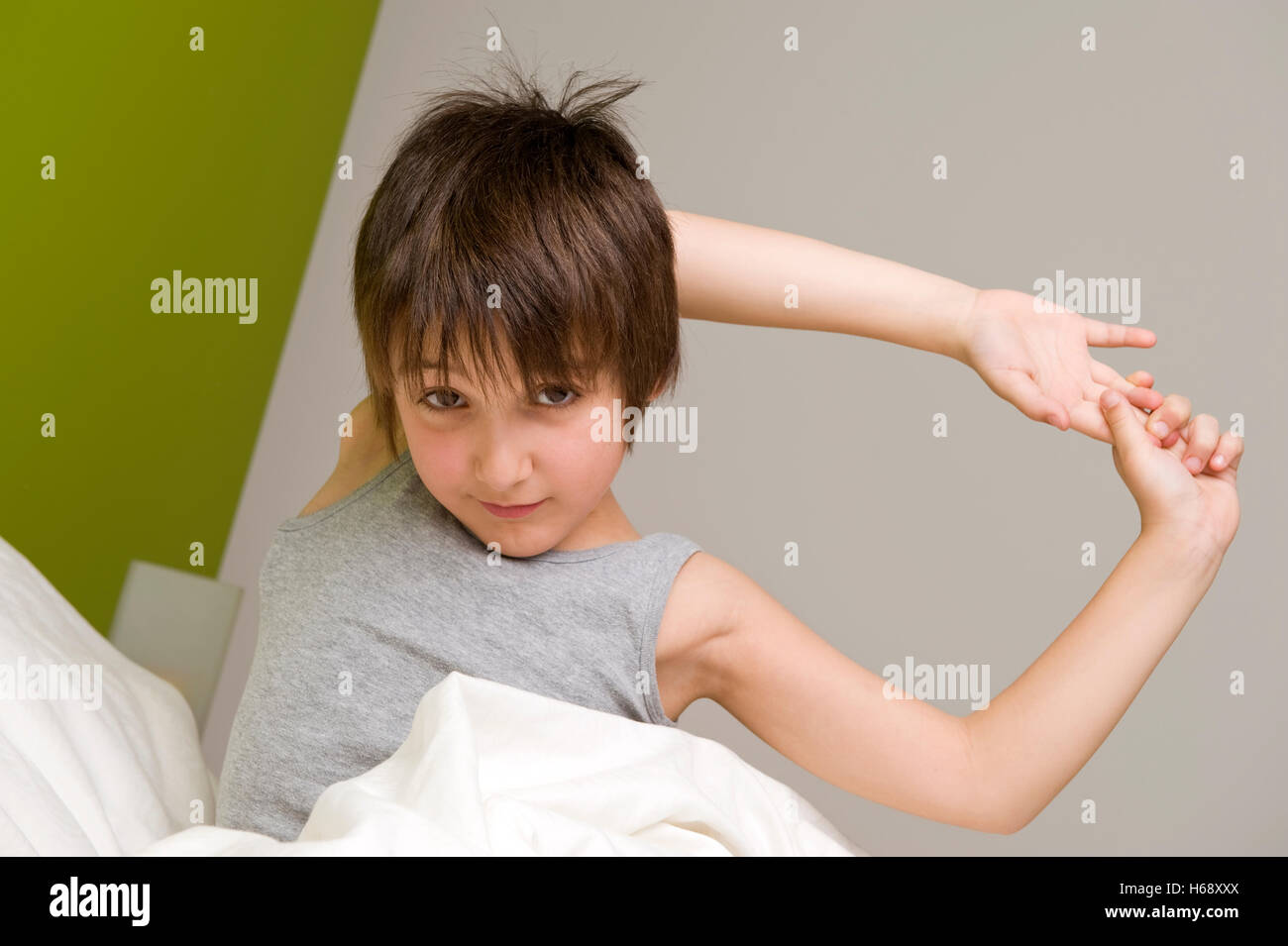 Little boy waking up in the morning Stock Photo - Alamy