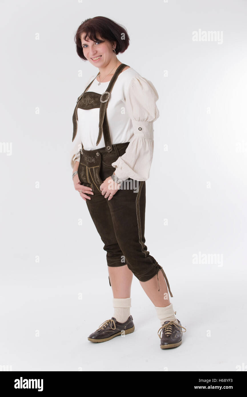 Woman wearing Lederhose, traditional Bavarian leather shorts Stock Photo -  Alamy