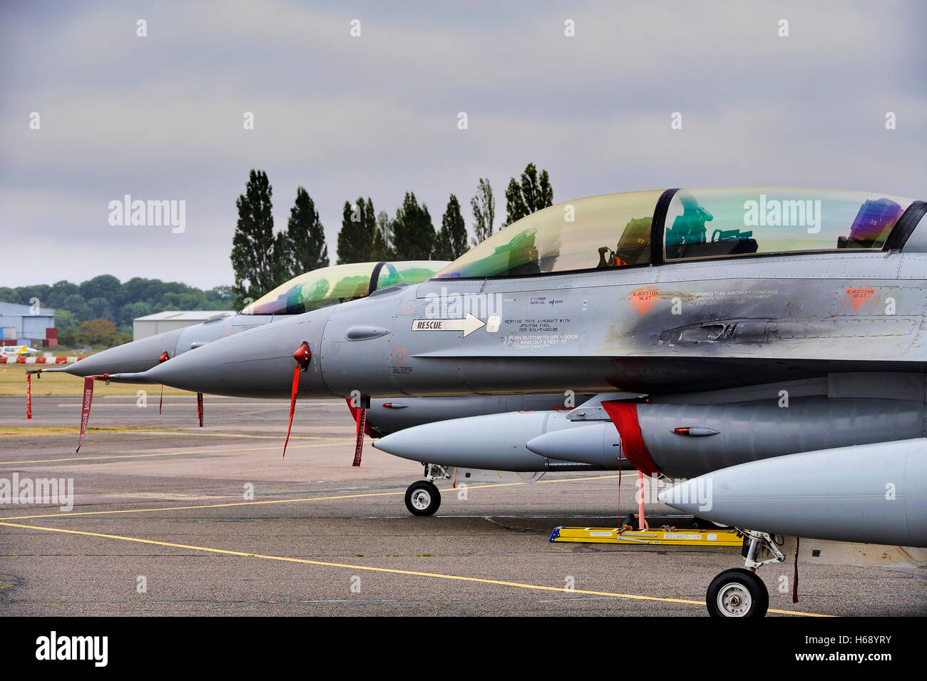 Two Norwegian Air Force General Dynamics F-16s at North Weald Airfield, Essex, England, United Kingdom, Europe Stock Photo