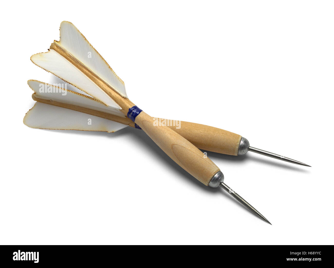 Two Wood and Feather Darts Isolated on White Background. Stock Photo