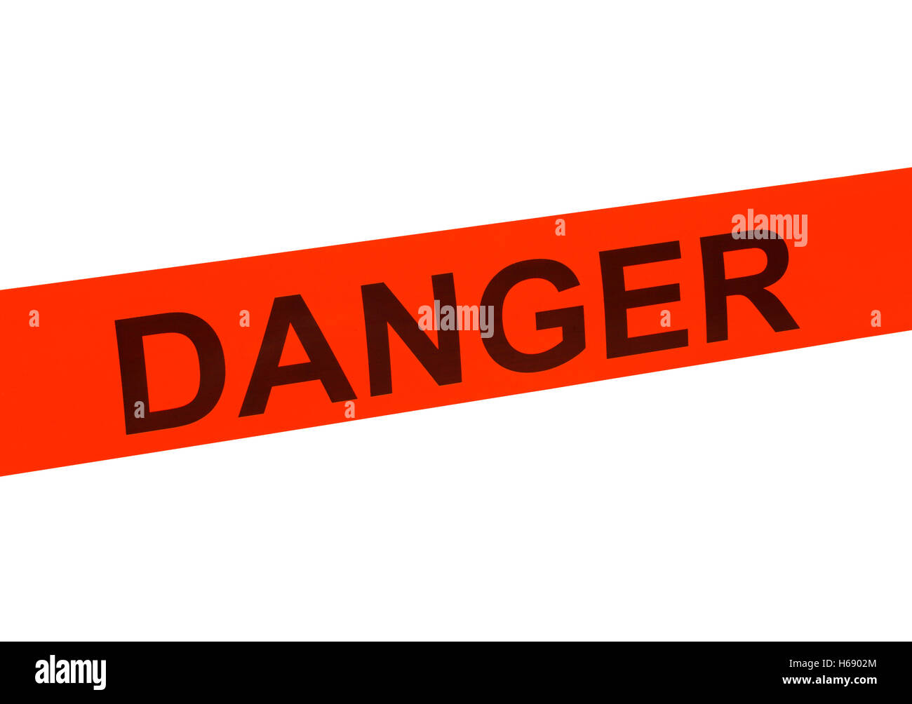 Orange Danger Cordon Tape Isolated on White Background. Stock Photo