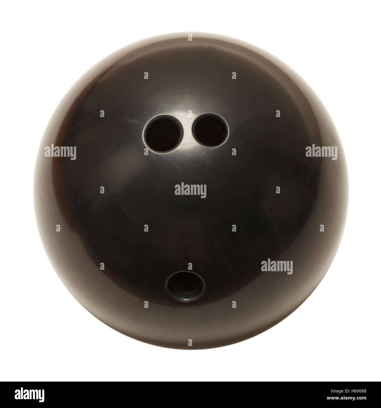 Black Bowling Ball with Holes Isolated on White Background. Stock Photo
