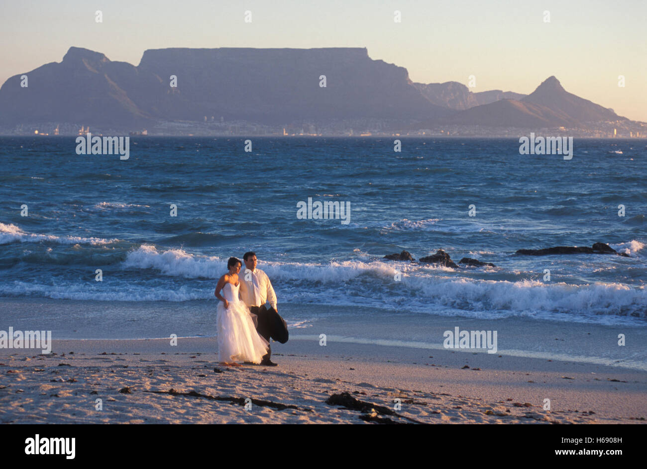 Wedding Couple On The Beach In Bloubergstrand View On Table Stock