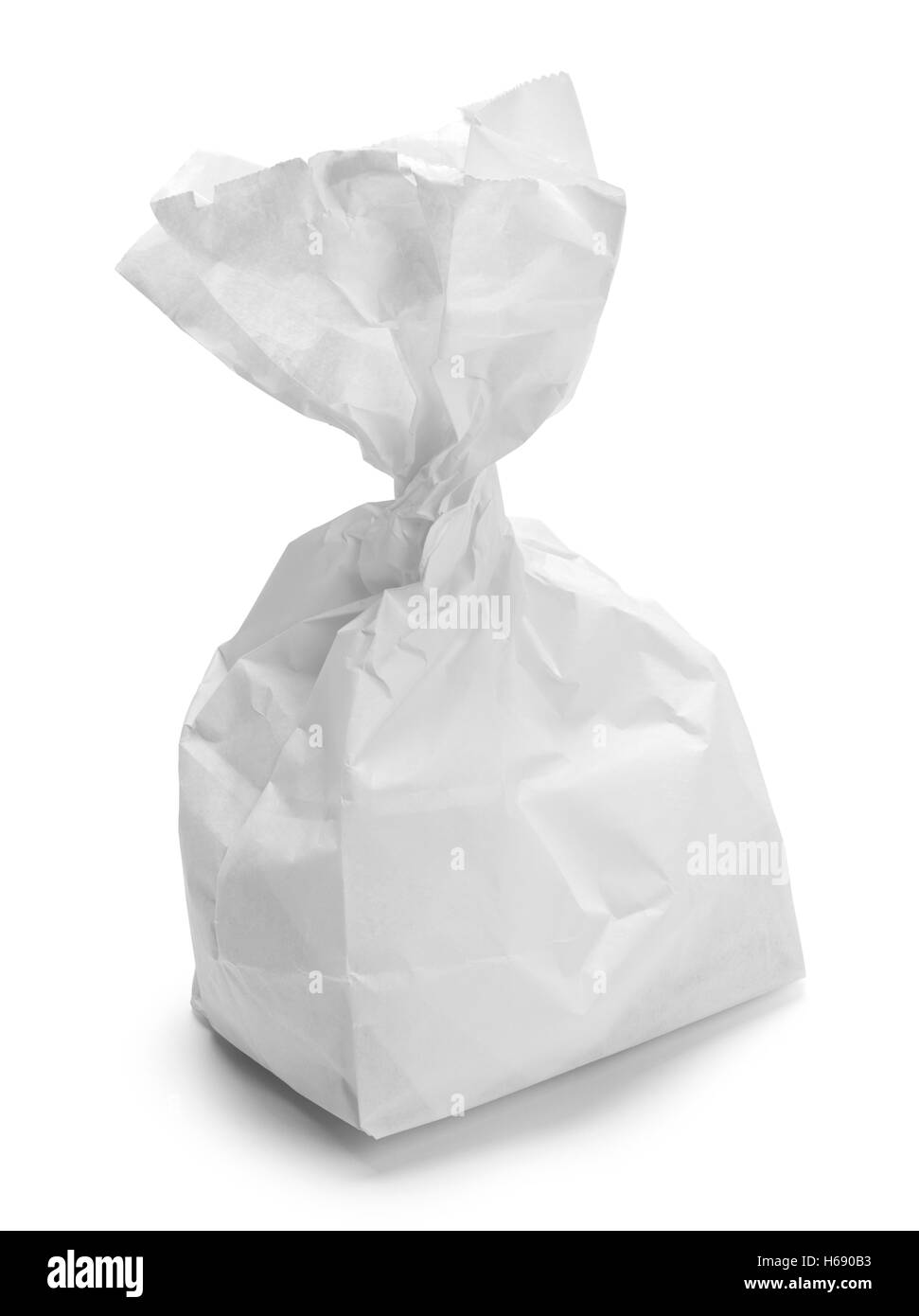 Twisted White Lunch Bag Isolated on White Background. Stock Photo