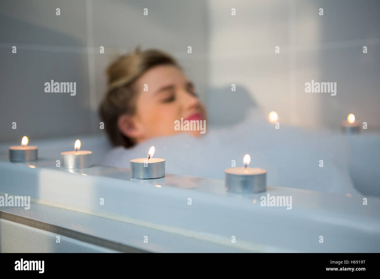 Woman taking bath in bathtub Stock Photo Alamy
