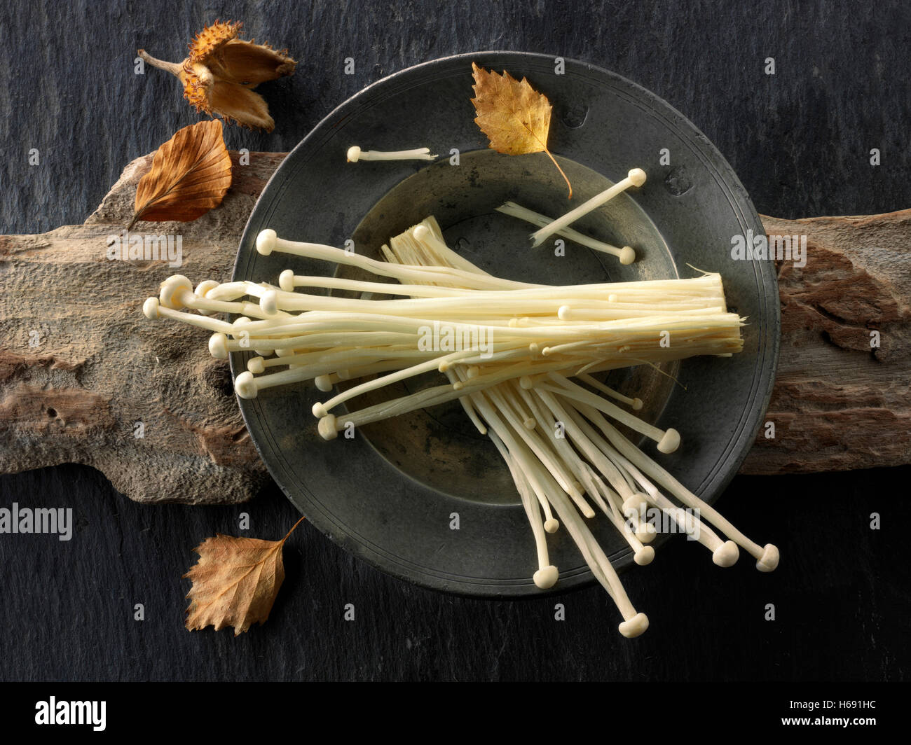 Fresh picked Pleurotus Eryngii straw mushrooms un cooked Stock Photo