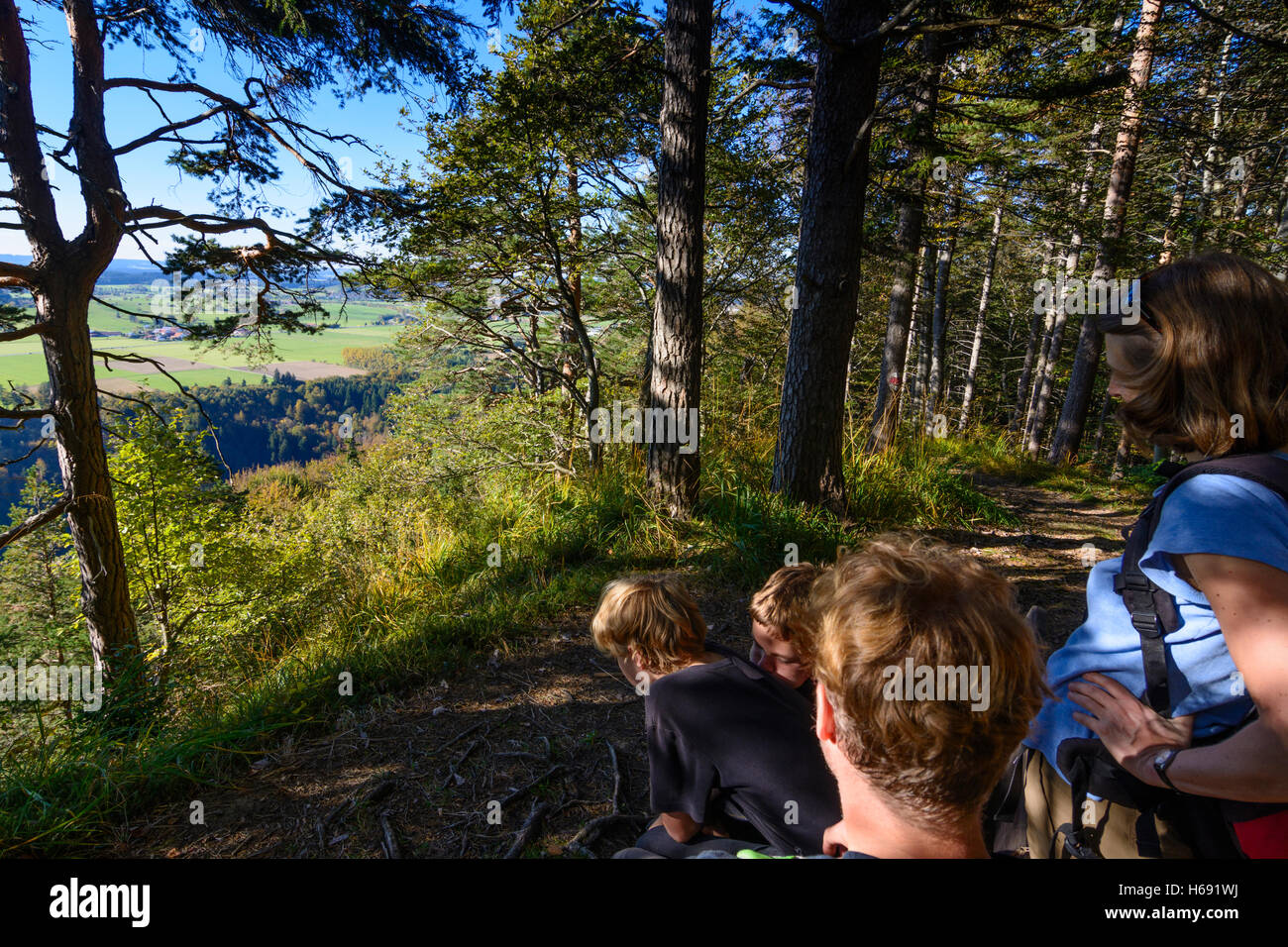Böbing: family at bench in forest, view to gorge Ammerschlucht river Ammer, Oberbayern, Upper Bavaria, Bayern, Bavaria, Germany Stock Photo