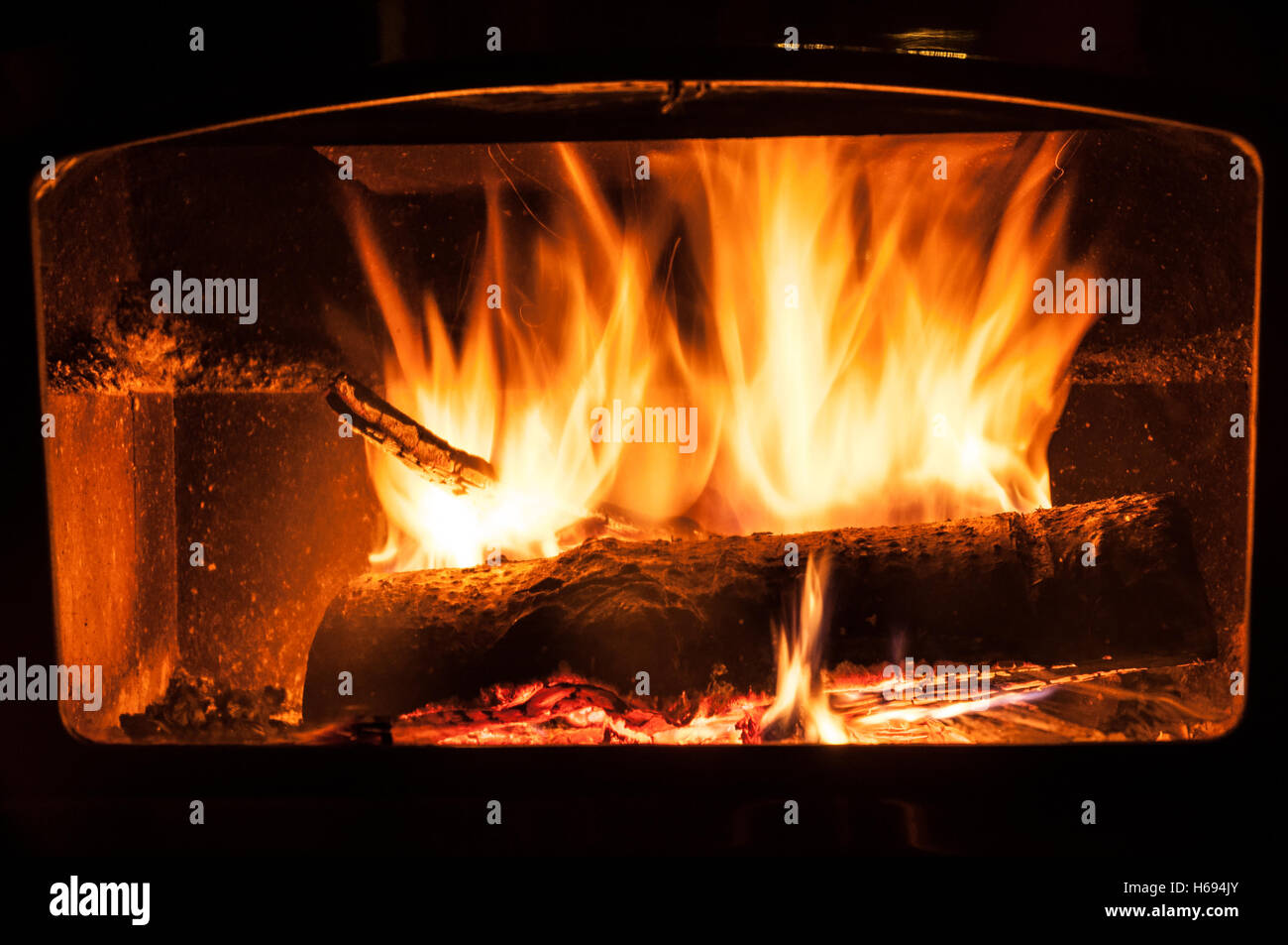 Fireplace logs on fire Stock Photo Alamy