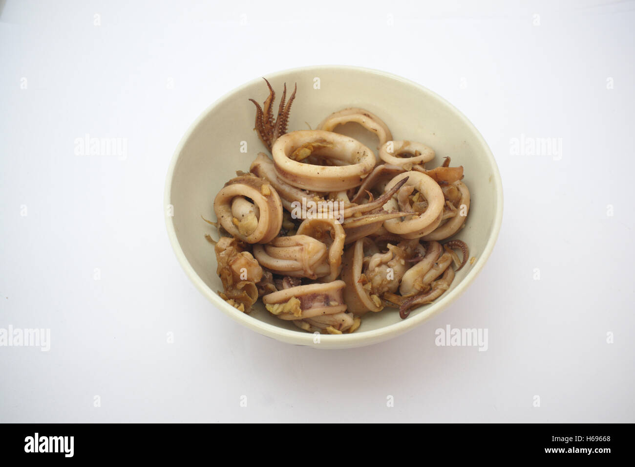 Thai cuisine , Squid stir fried with garlic Stock Photo - Alamy