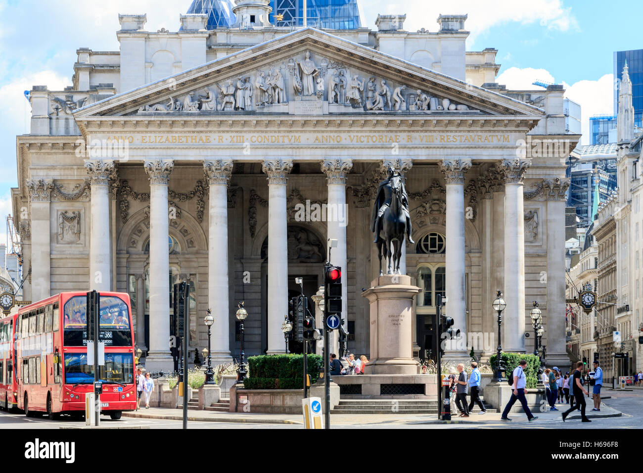 London, UK - August 06, 2016 - Traffic and walking people in front of the Royal Exchange Stock Photo