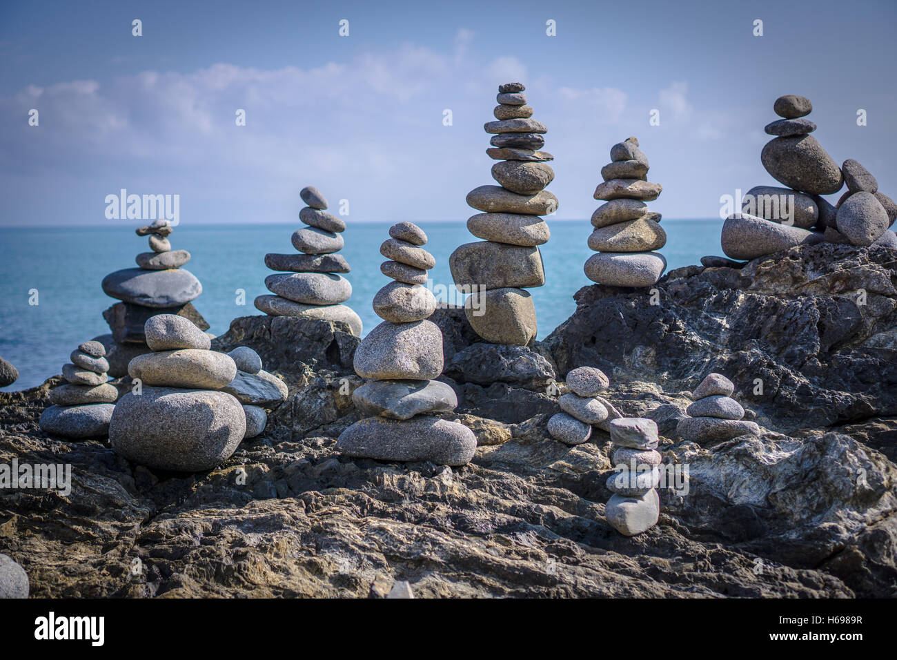 A collection of beautifully arranged stones by the beach near Cairns in Queensland Stock Photo