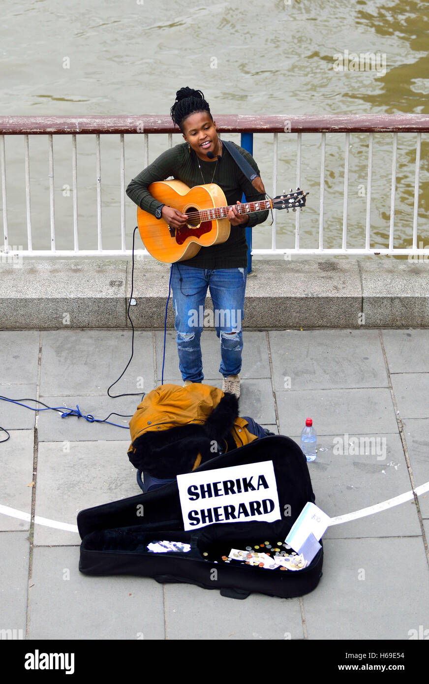Sherika Sherard, musician, busking on the South Bank, by the River Thames, London Stock Photo
