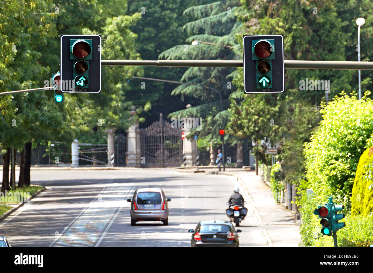 green street light  with traffic Stock Photo