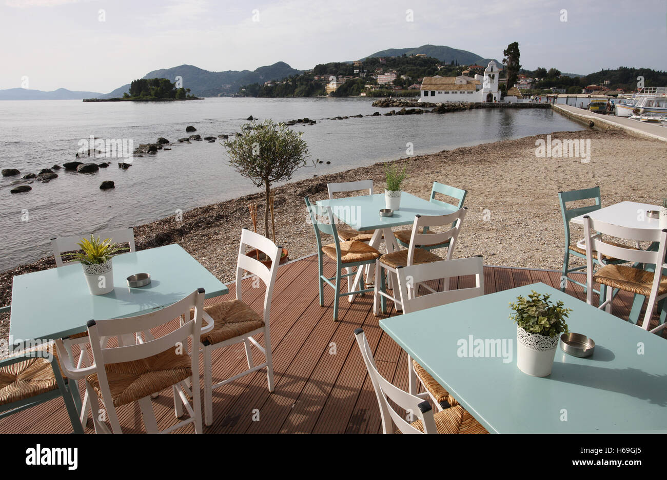 A pleasant restaurant by the sea at Kanoni Corfu Greece Stock Photo