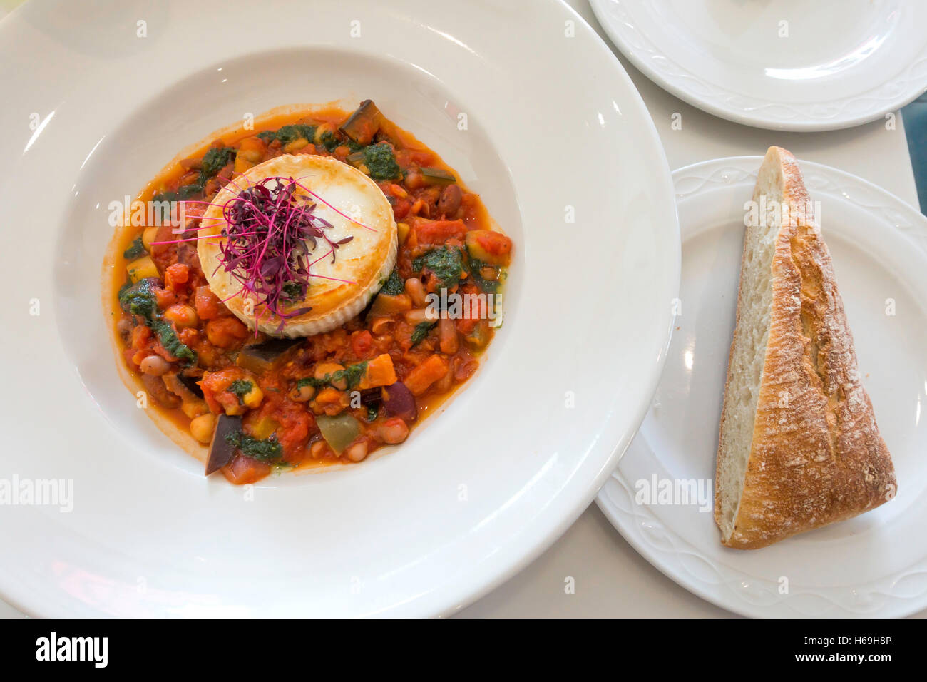 Café lunch Chick Pea five bean cassoulet with grilled goats cheese and