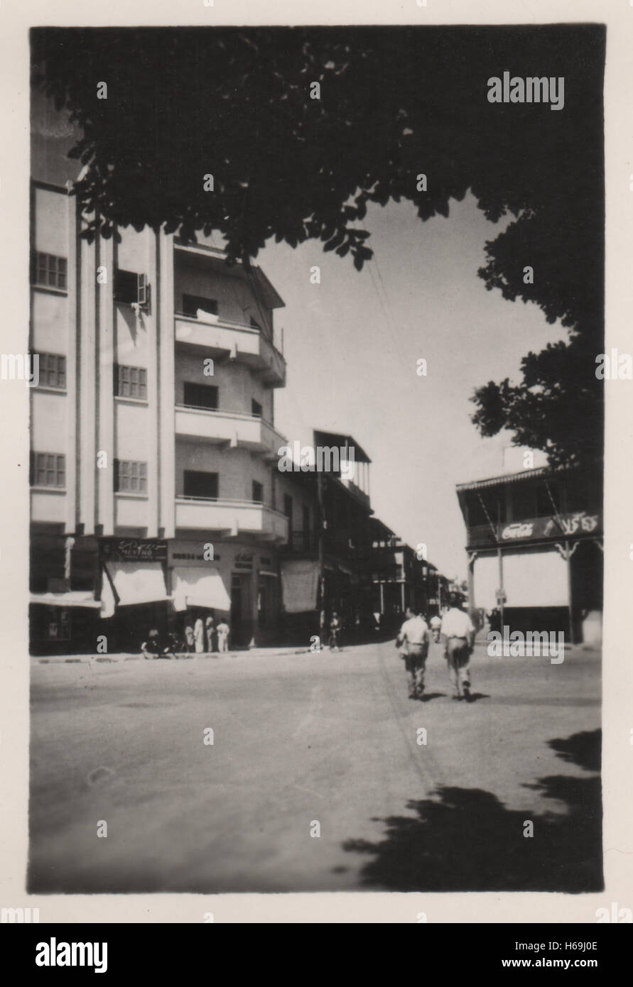 Negrelli Street now called El Gaish Street in Ismailia Egypt with city buildings in the background in the period prior to the British withdrawal from Egypt and the Suez crisis. Photographed in 1952 Stock Photo