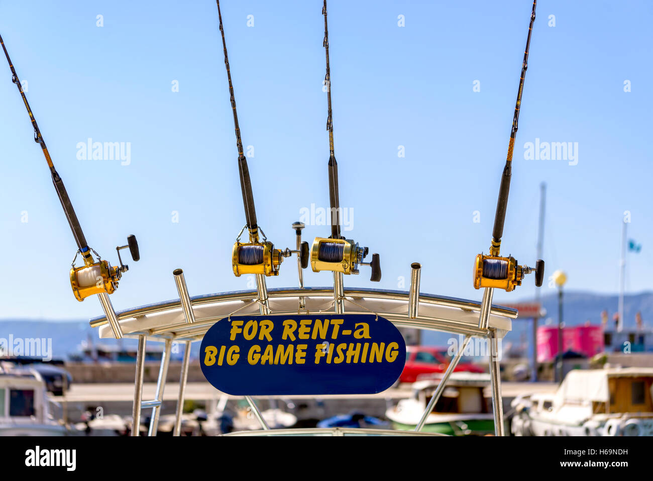 Big game fishing and equipment for rental with sign and equipment displayed Stock Photo