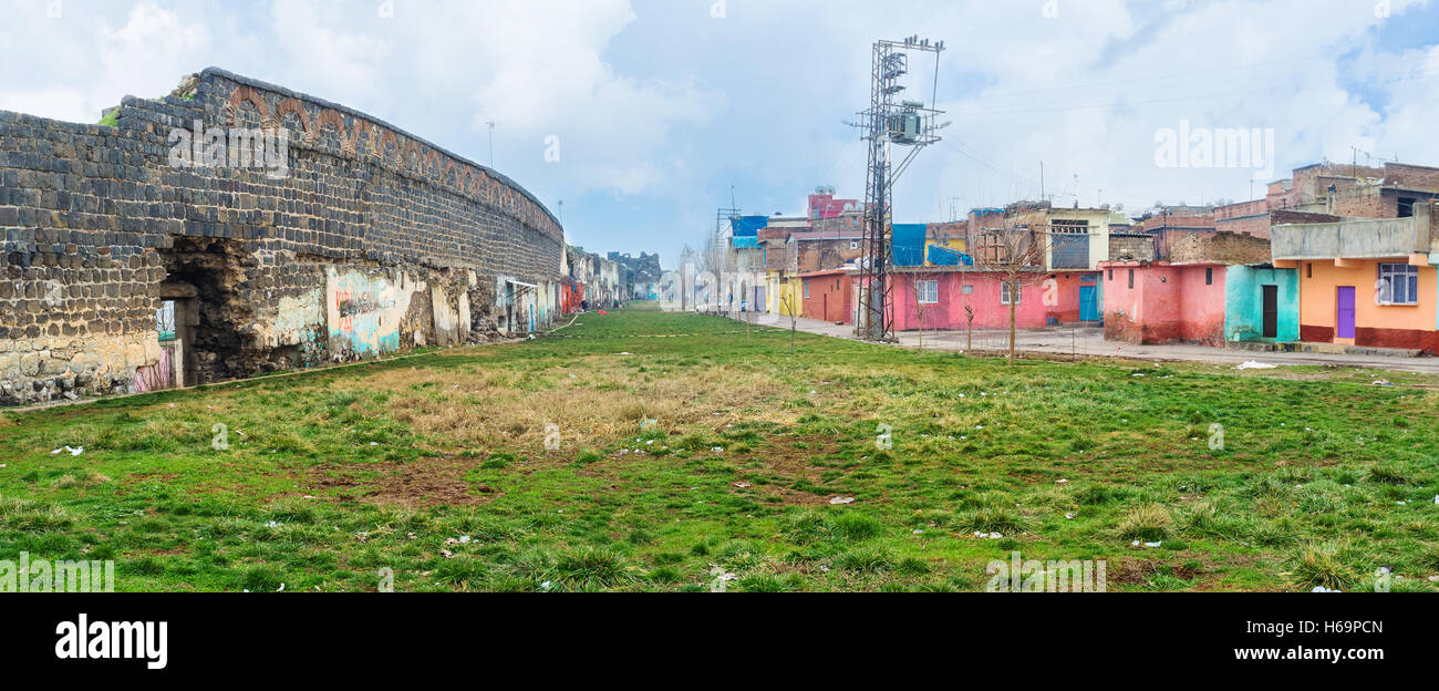 The old residential district inside the town walls consists of the tiny colorful houses and slums, Diyarbakir, Turkey. Stock Photo