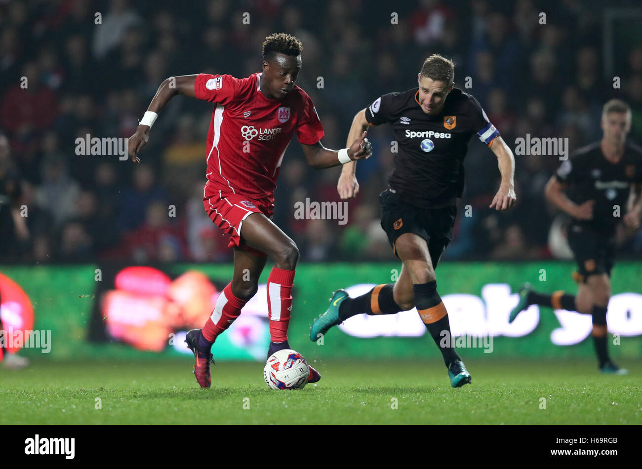 Bristol City's Tammy Abraham (left) and Hull City's Michael Dawson ...