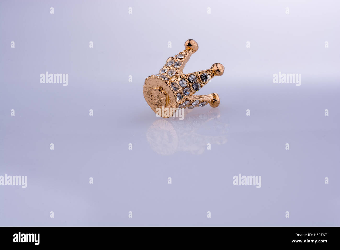 Golden color crown model with pearls on white background Stock Photo ...